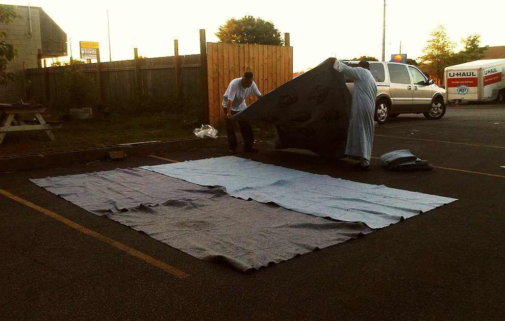18 - Hassan and Bilal spread fifth U-Haul moving blankets as Chatham Maghrib Prayer space - Saturday July 13 2013